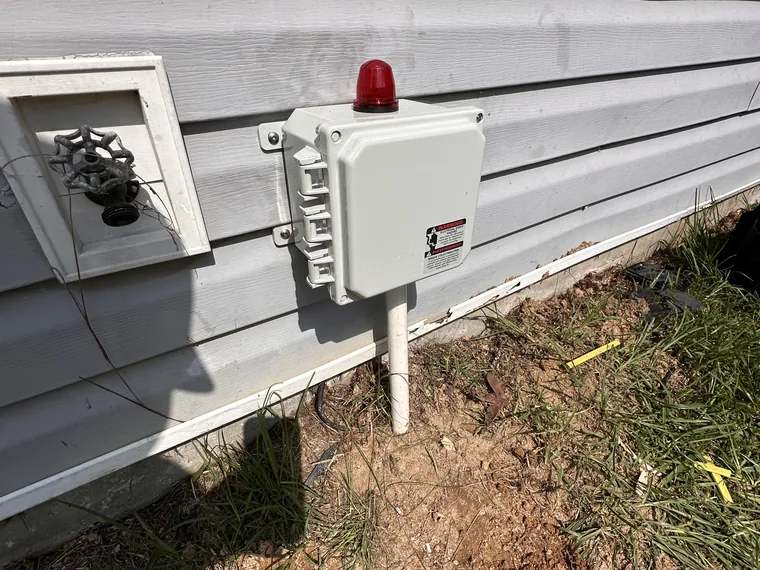 Weather-tight septic alarm panel install by SepticRooter™ in Woodstock, GA