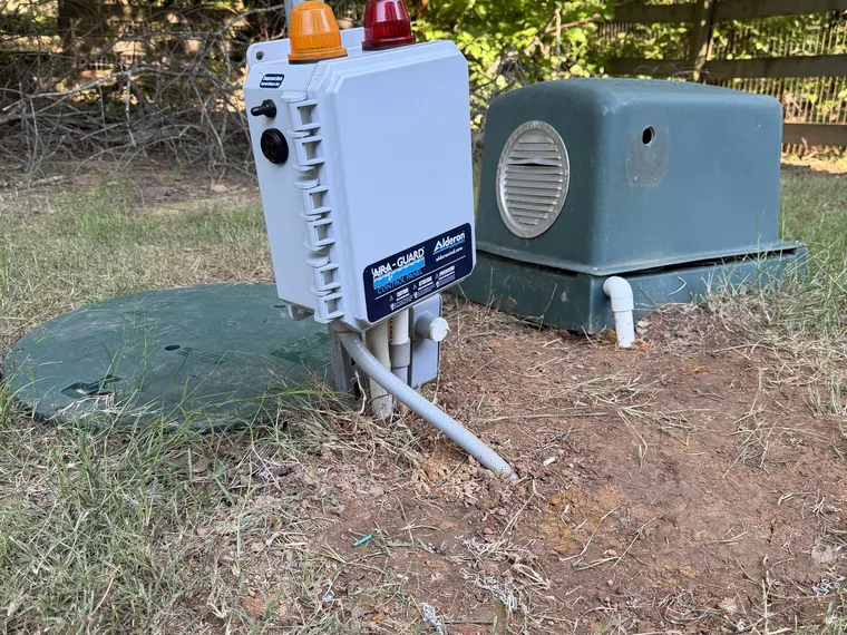 Septic alarm panel and tank riser serviced together in Woodstock, Cherokee County